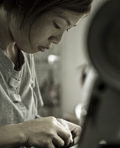 Women at one of our Chinese factories, holding hands