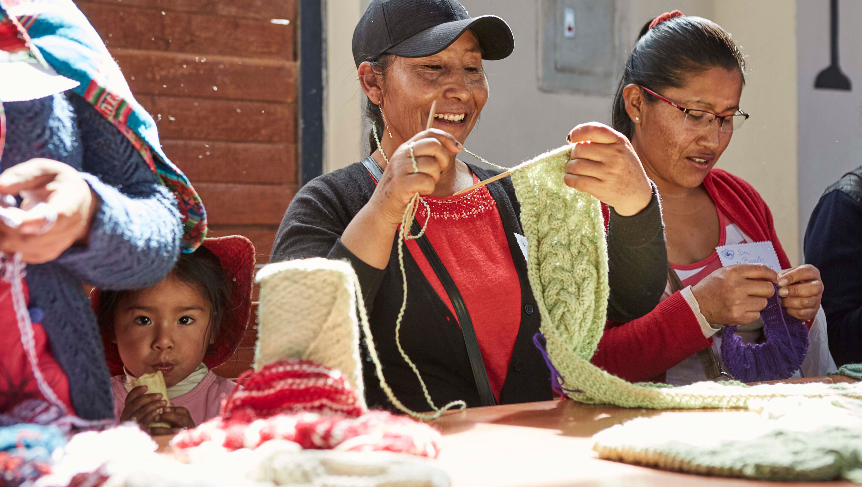 Women and children at community-based workshop.