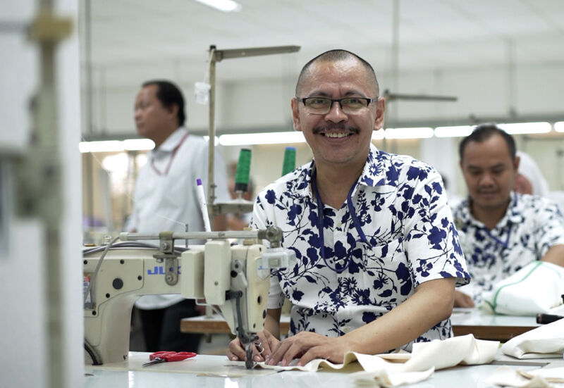 Man working at garment factory.