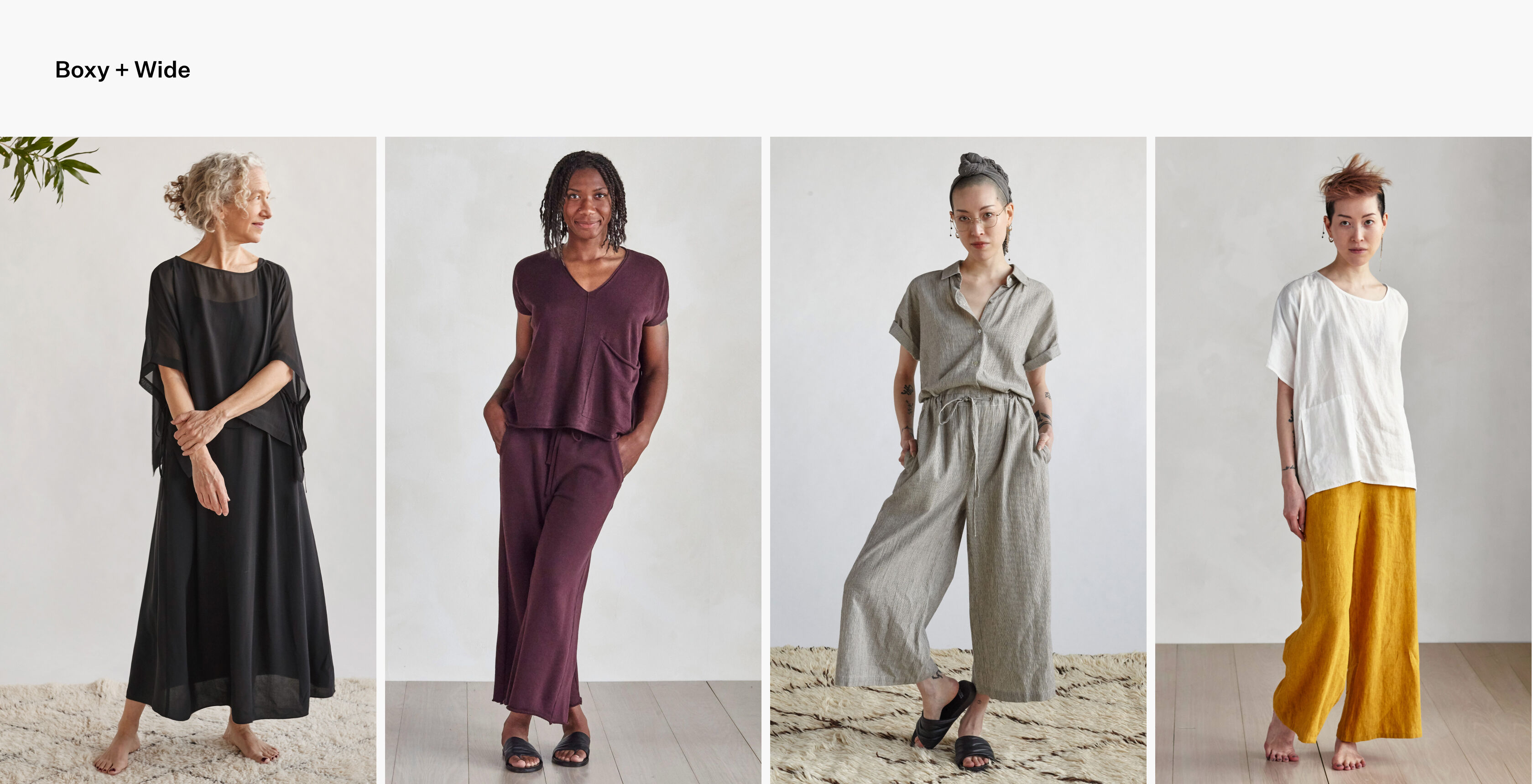 Women wearing boxy tops over wide-leg pants.