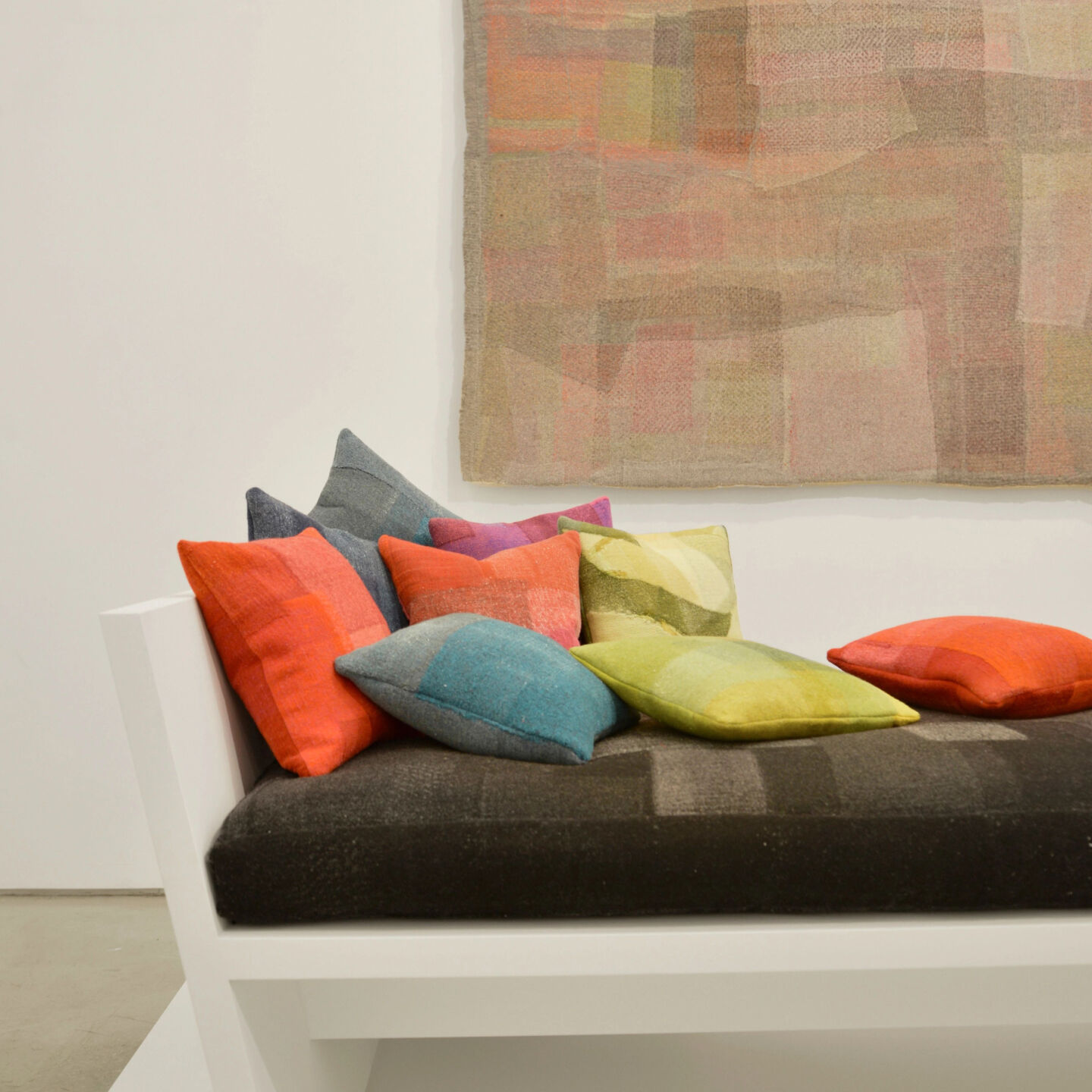 Felted EILEEN FISHER pillows and wall hangings made from textile waste. Felted EILEEN FISHER pillows and wall hangings made from textile waste.