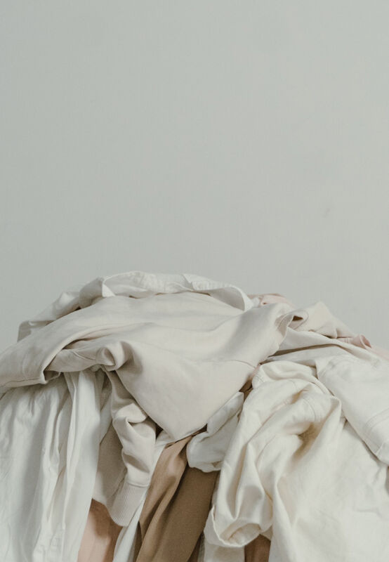 A pile of neutral-colored clothing.