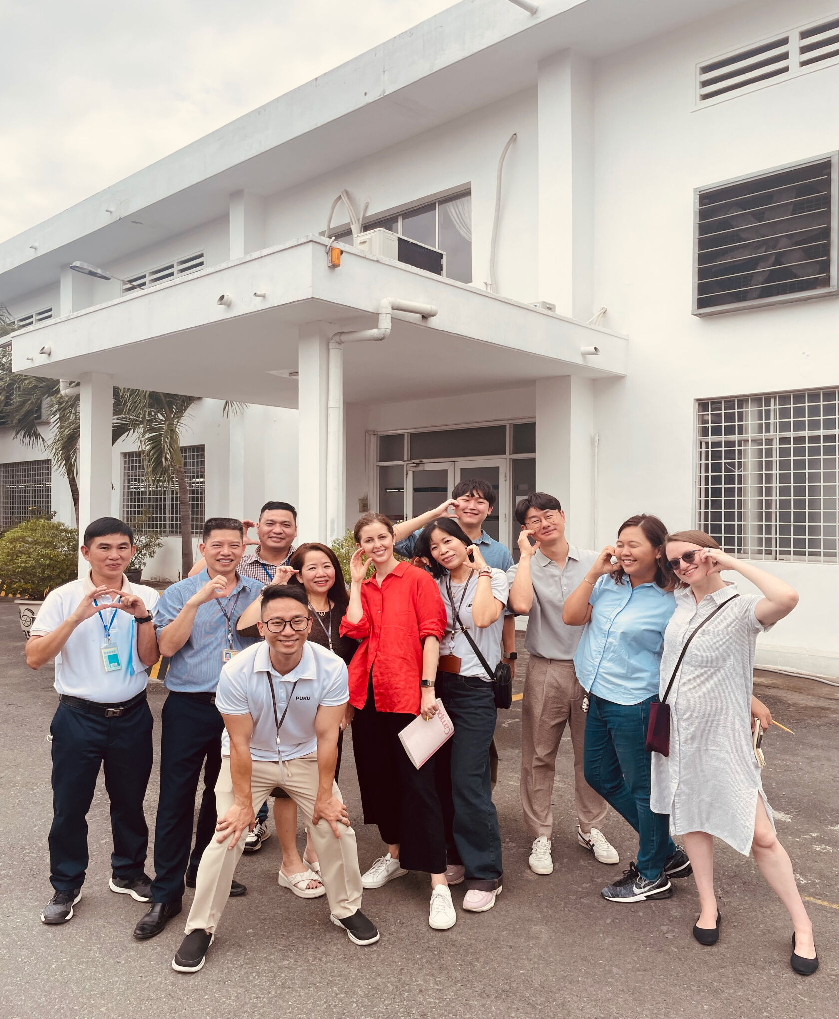 The management team at Puku, a factory in Vietnam.