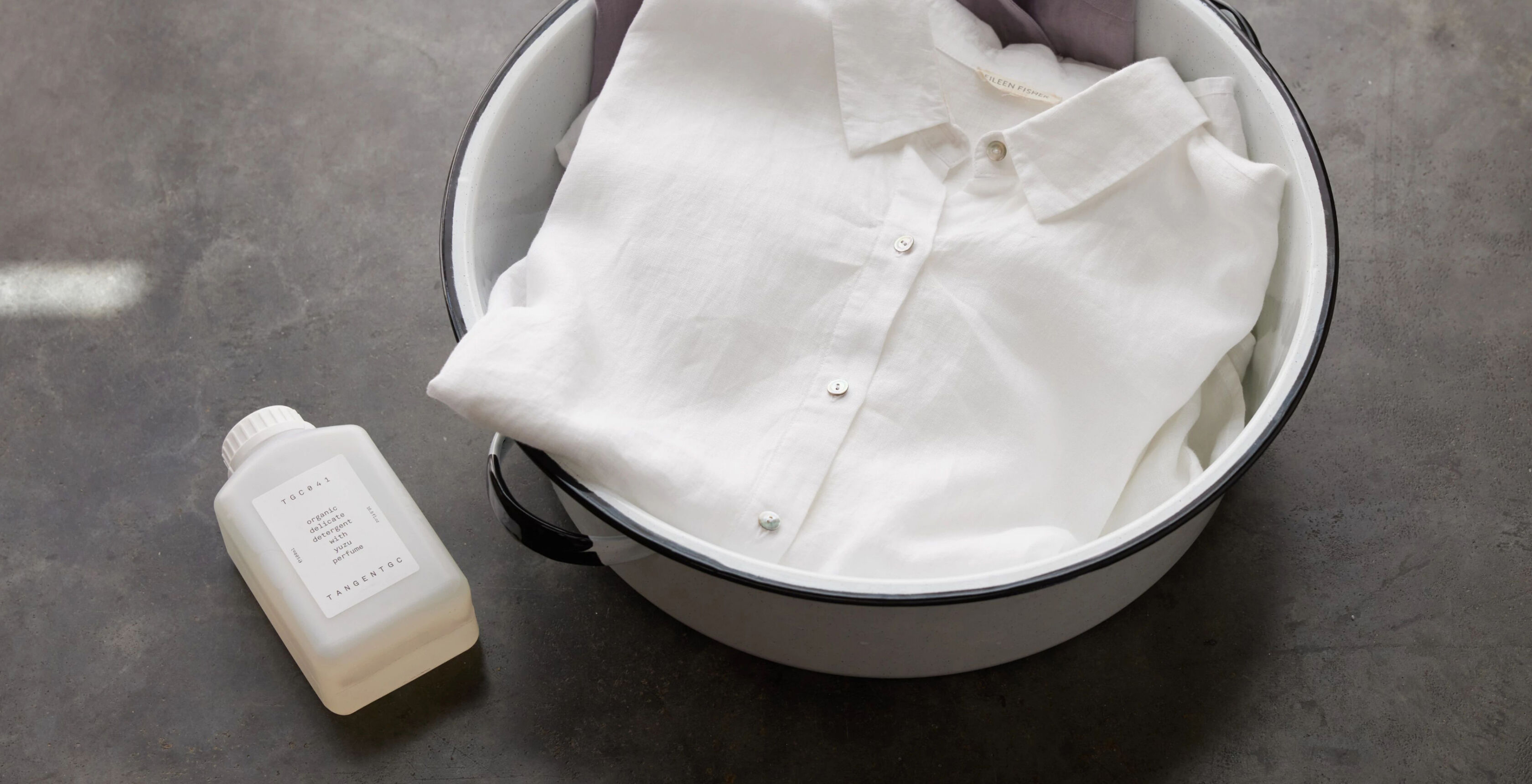 Linen shirts being hand washed.