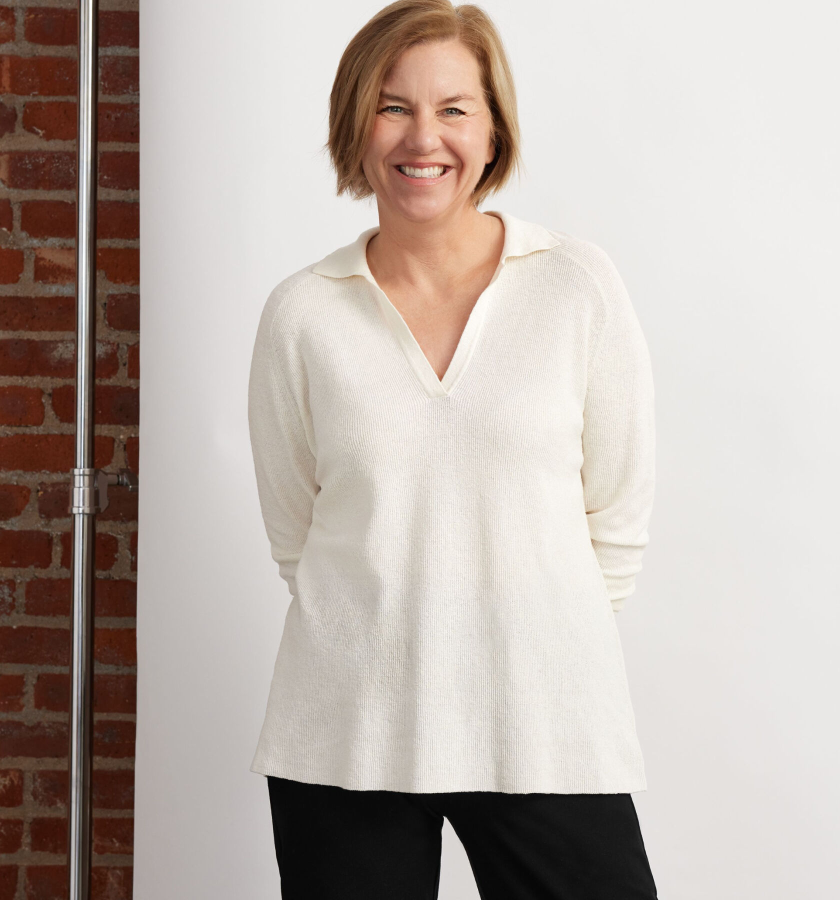 Lisa Williams, EILEEN FISHER CEO wearing white top.