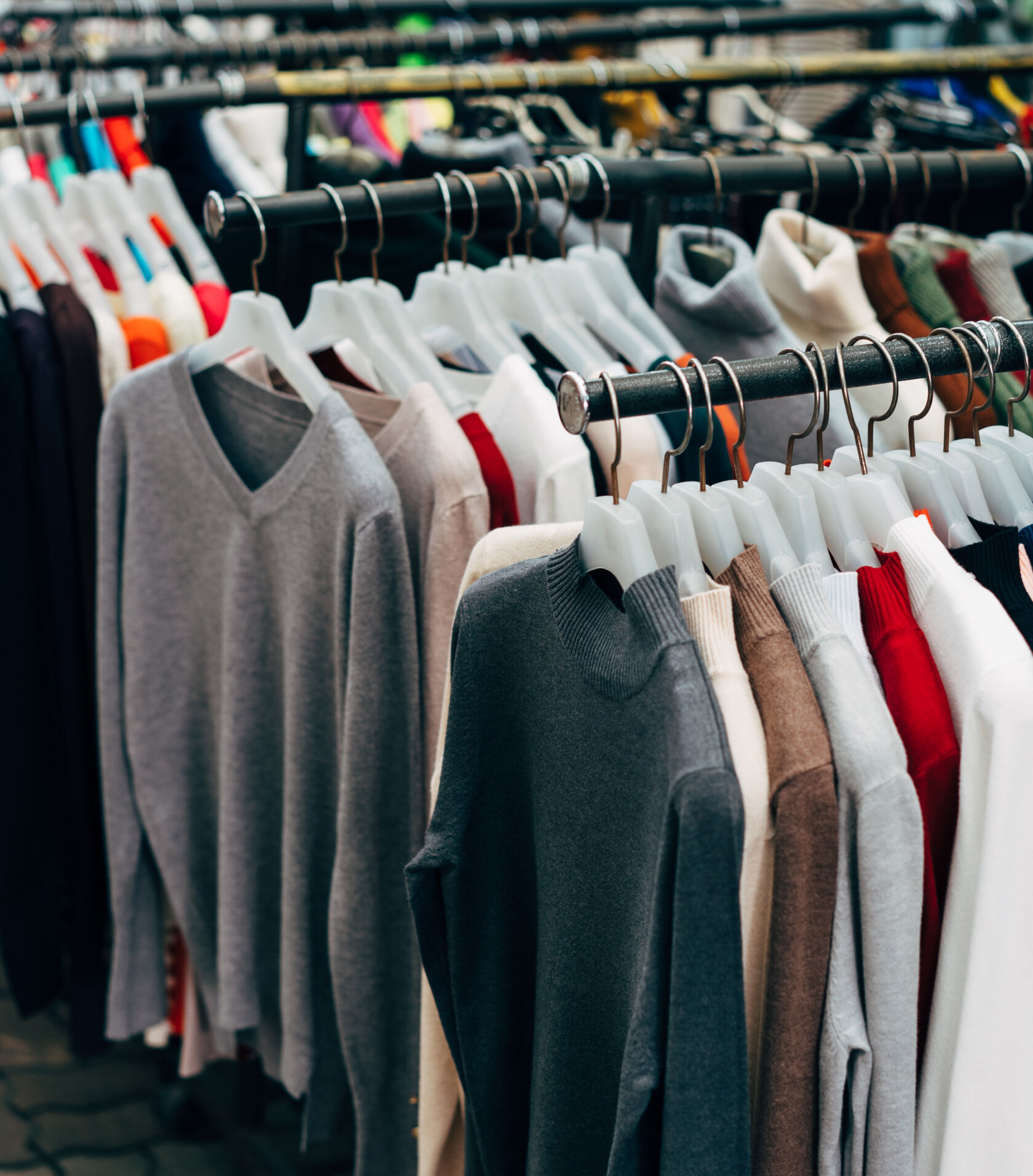 A rack of secondhand clothing at thrift store. A rack of secondhand clothing at thrift store.