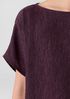 Woven Plissé Dolman Sleeve Top