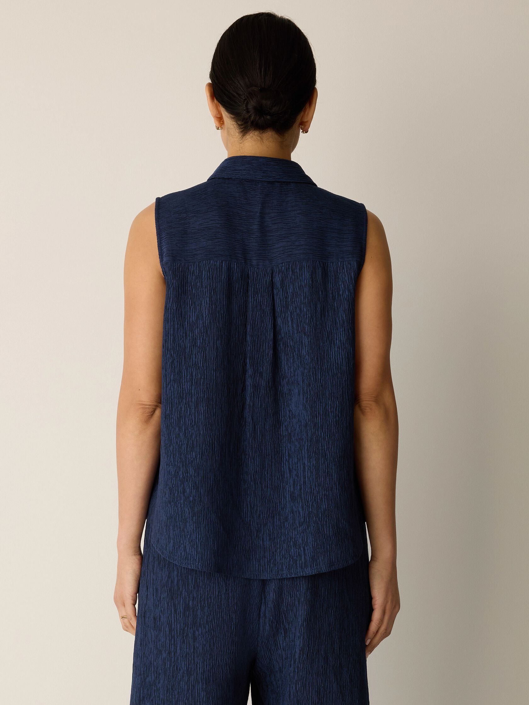 Woven Pliss&eacute; Sleeveless Shirt