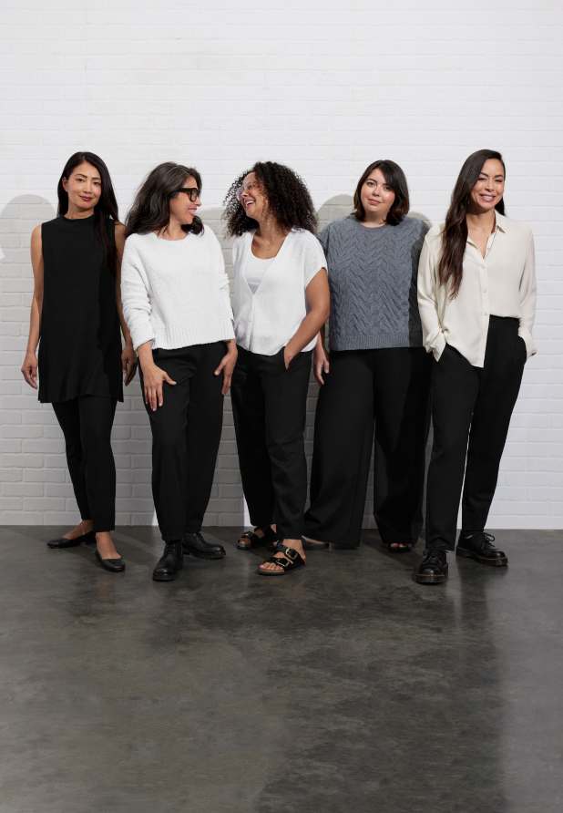 Group of women wearing different EILEEN FISHER pant shapes.