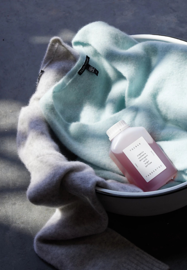 Hand washing a cashmere sweater at home.